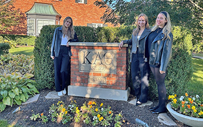 L-R: Gamma Epsilon chapter members Madison Howe, Holly Brown, and Kaydence Penrod visit Theta headquarters.